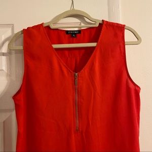Orange/red sleeveless blouse